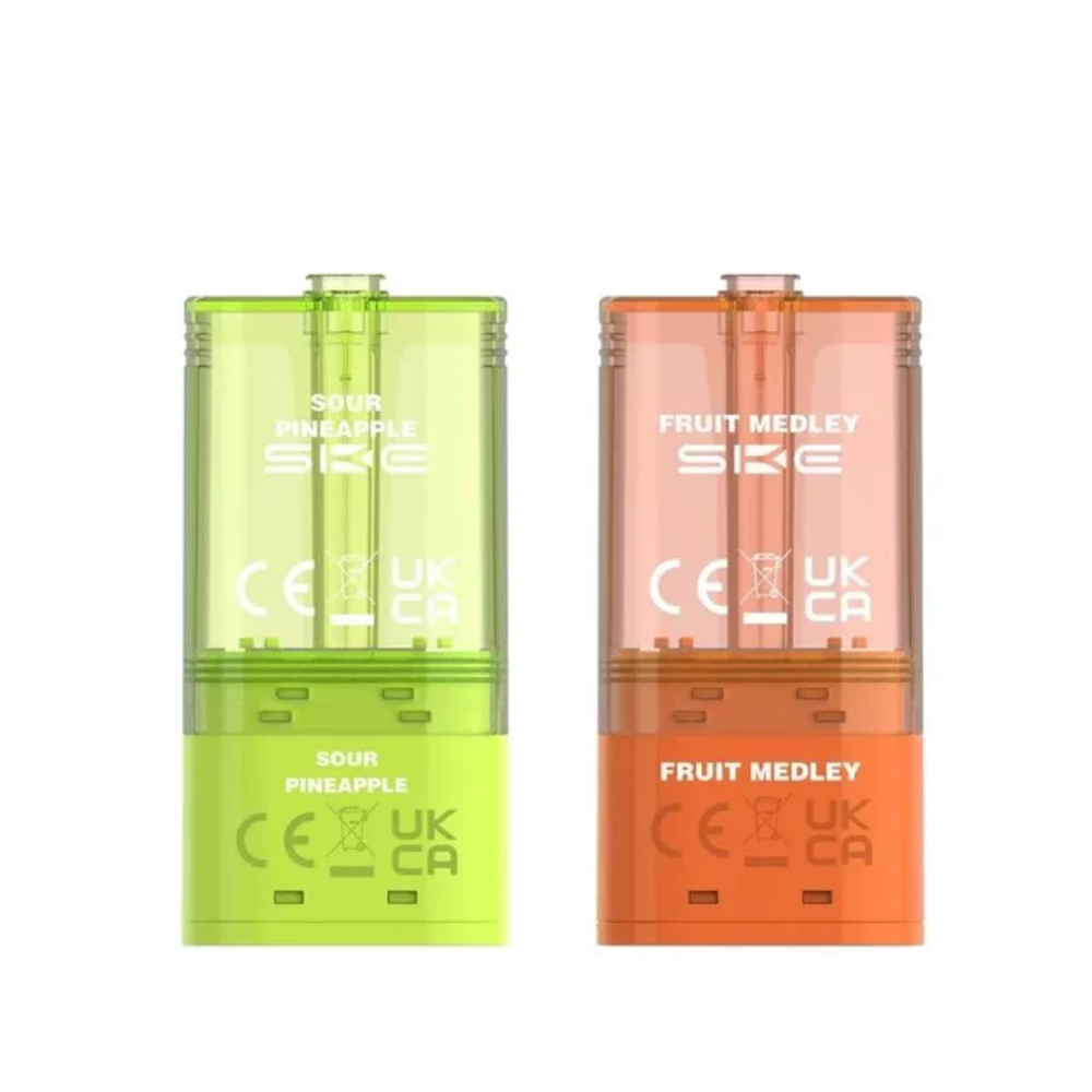 Two SKE vape devices, one green and one orange, on a white background.