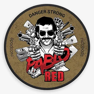 Circular sticker with a stylized graphic of a character holding guns and money, with text 'DANGER STRONG' and 'Pablo Red'.