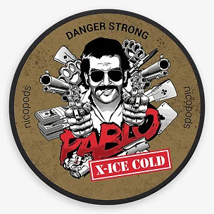 Circular sticker with a stylized graphic of a character holding guns and money, with text 'DANGER STRONG' and 'X-ICE COLD'.